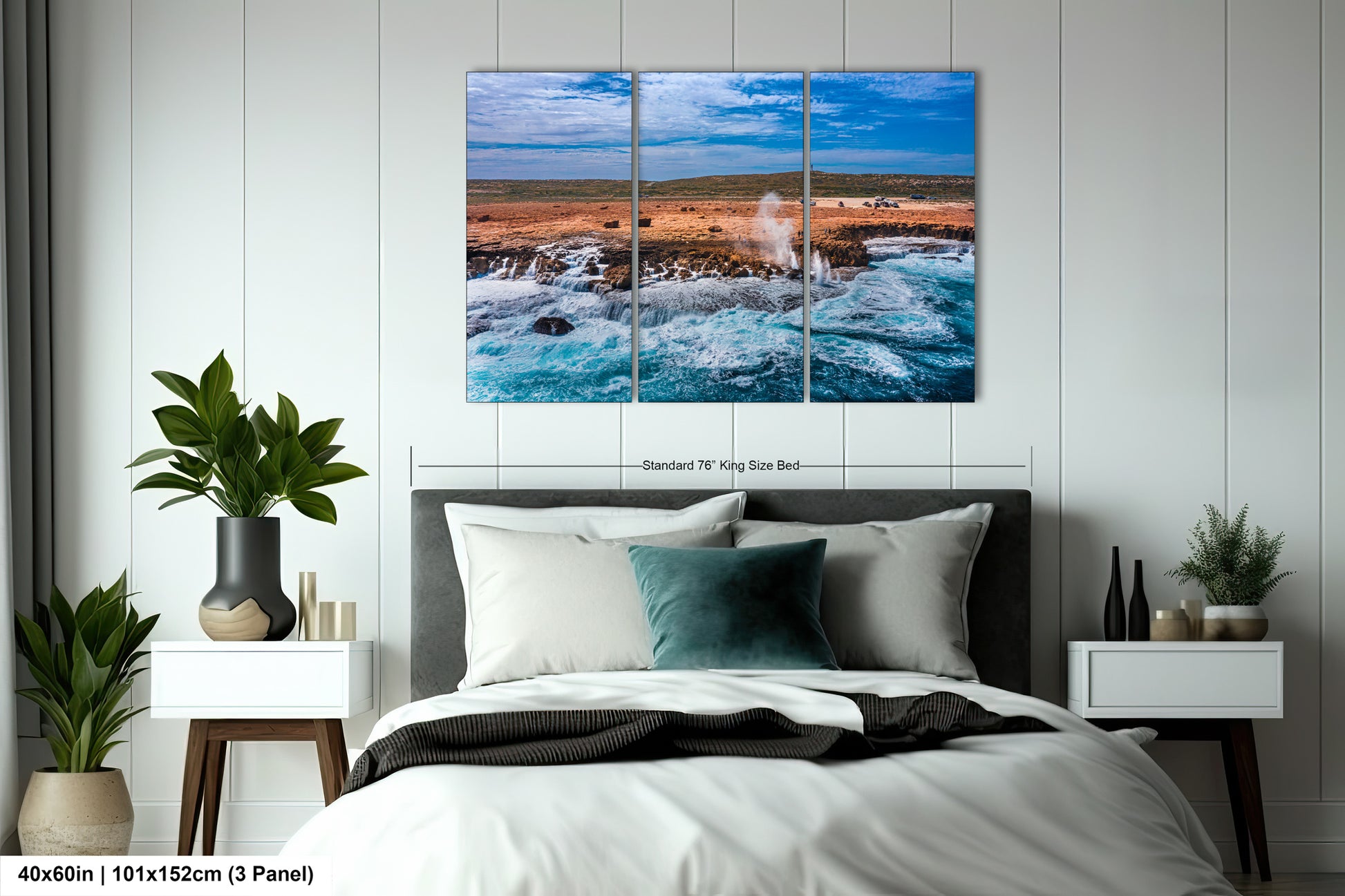 a bedroom scene with focus on the bed and the ocean