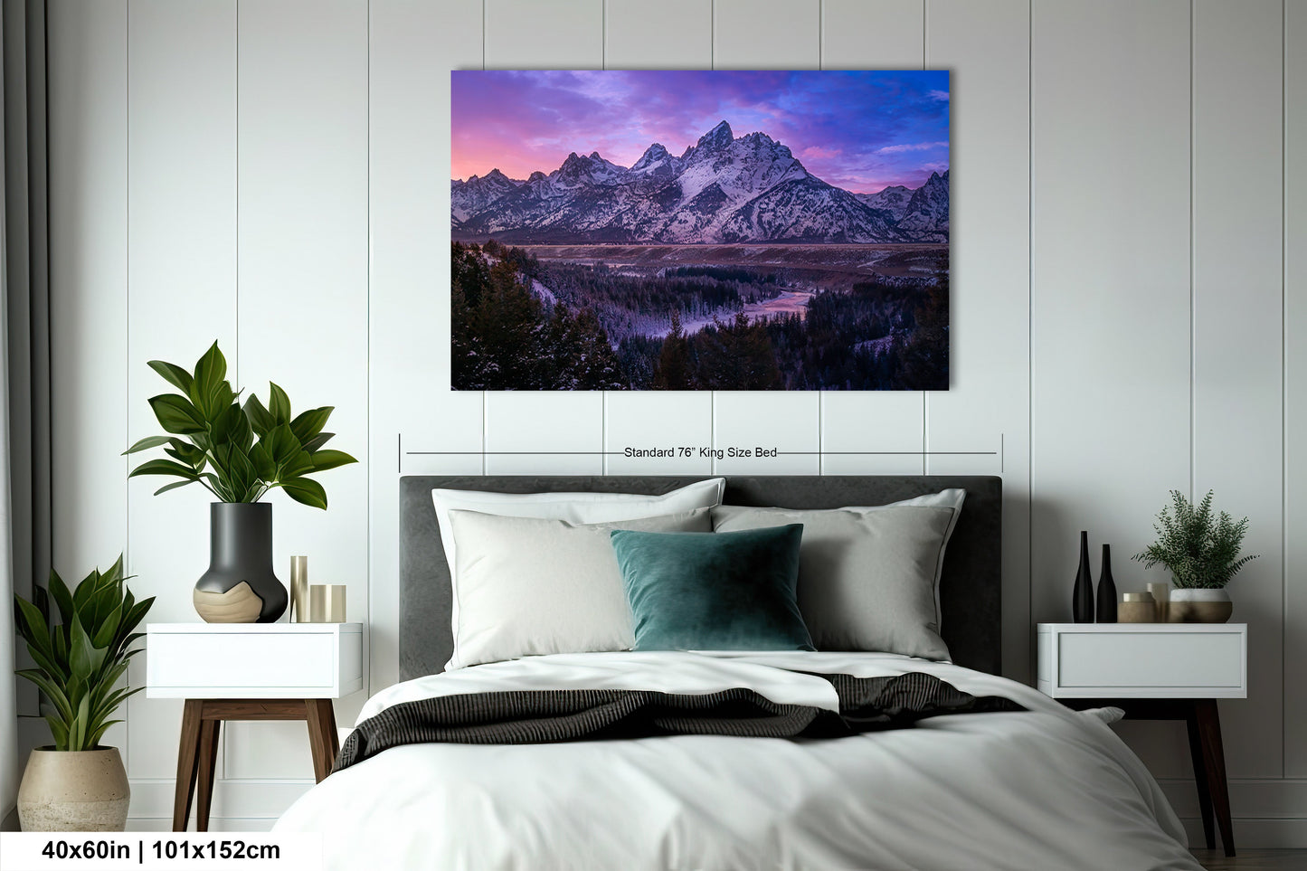 a bedroom with a bed and a painting on the wall