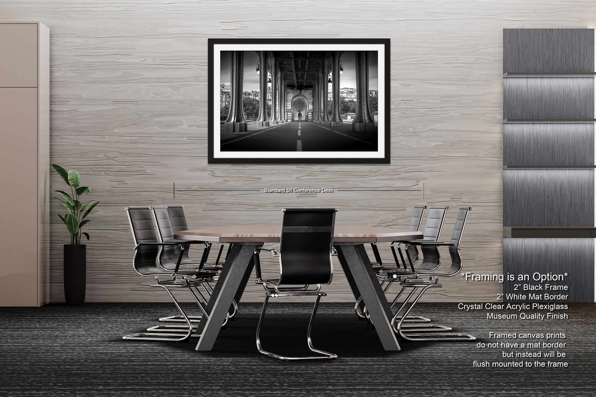 a black and white photo of a dining room