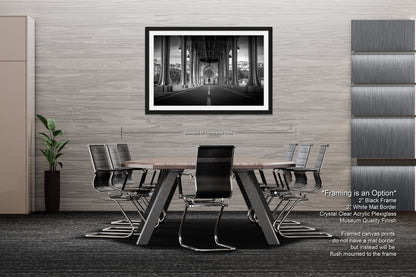 a black and white photo of a dining room