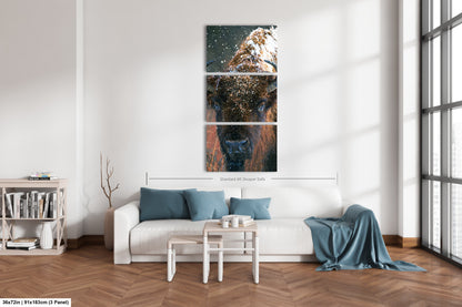 a living room with a couch and a painting on the wall