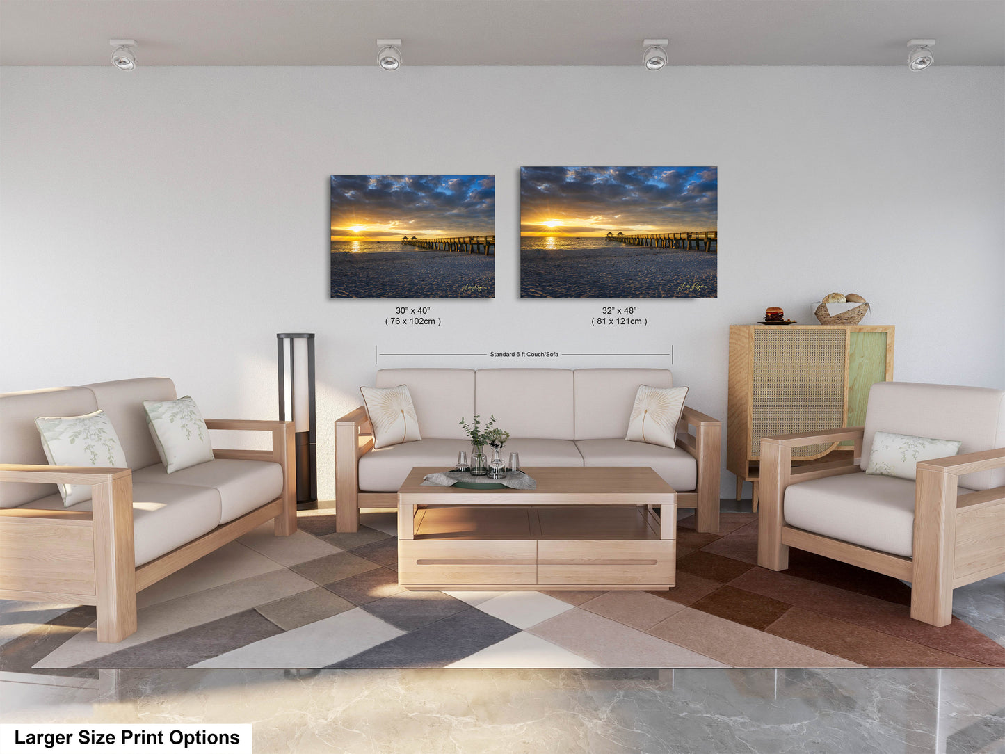 a living room with two pictures on the wall