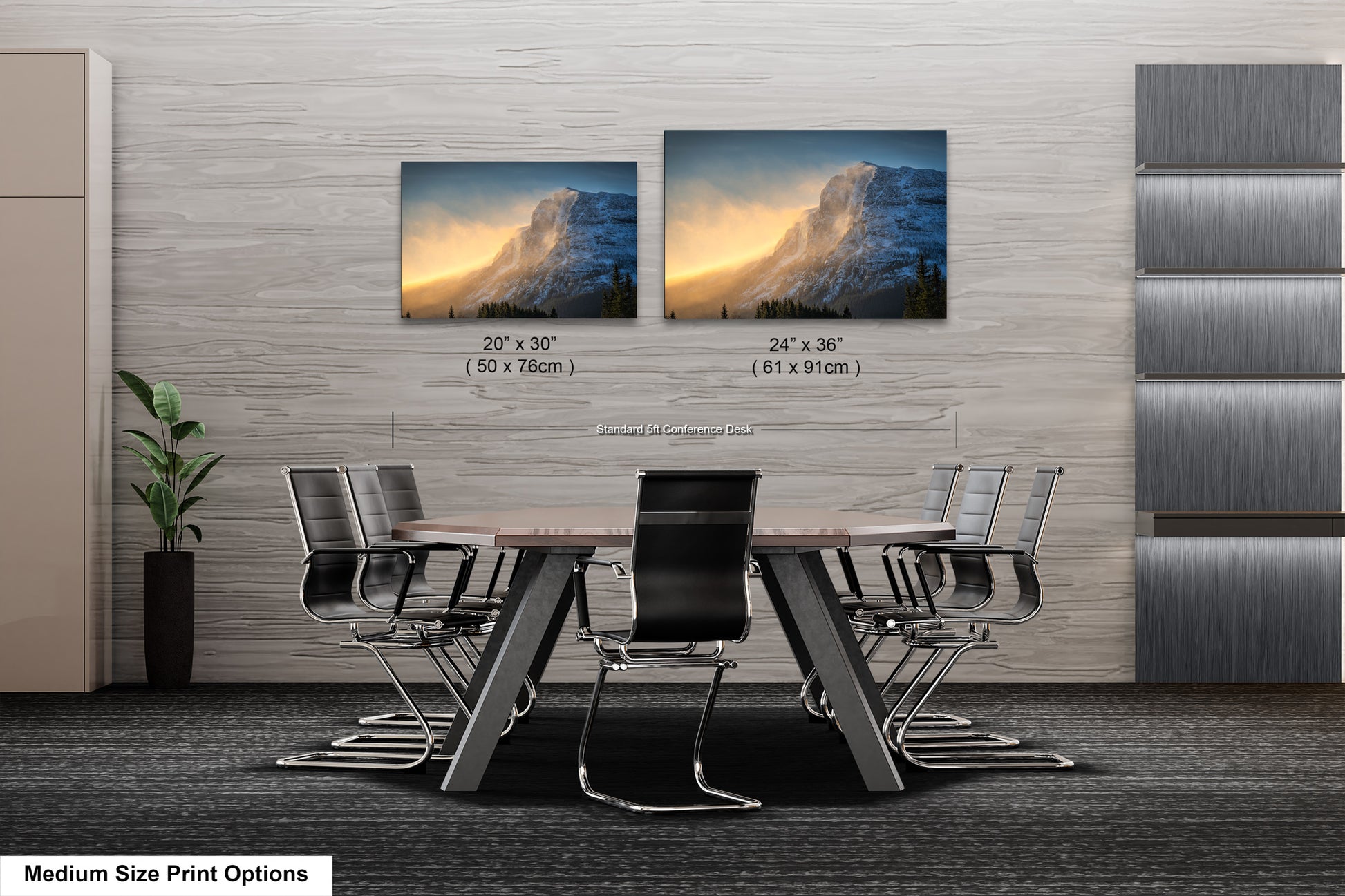 a dining room table with four chairs and two pictures on the wall