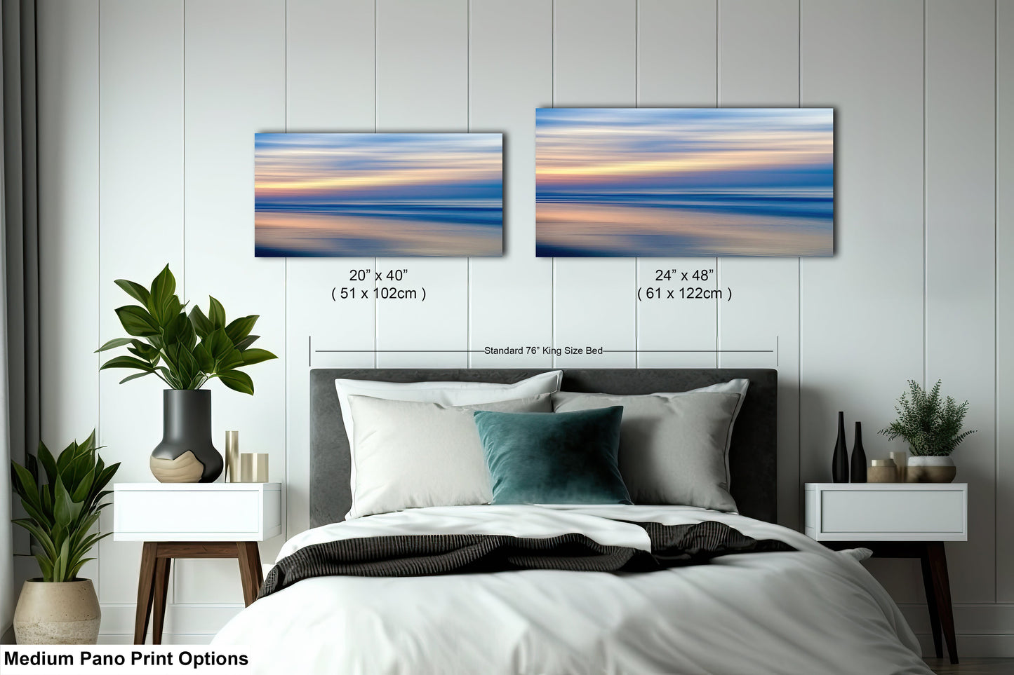 a bedroom with a bed and two paintings on the wall