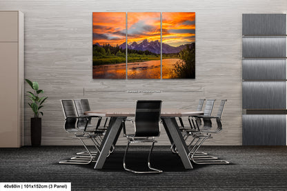 a dining room table with chairs and a painting on the wall