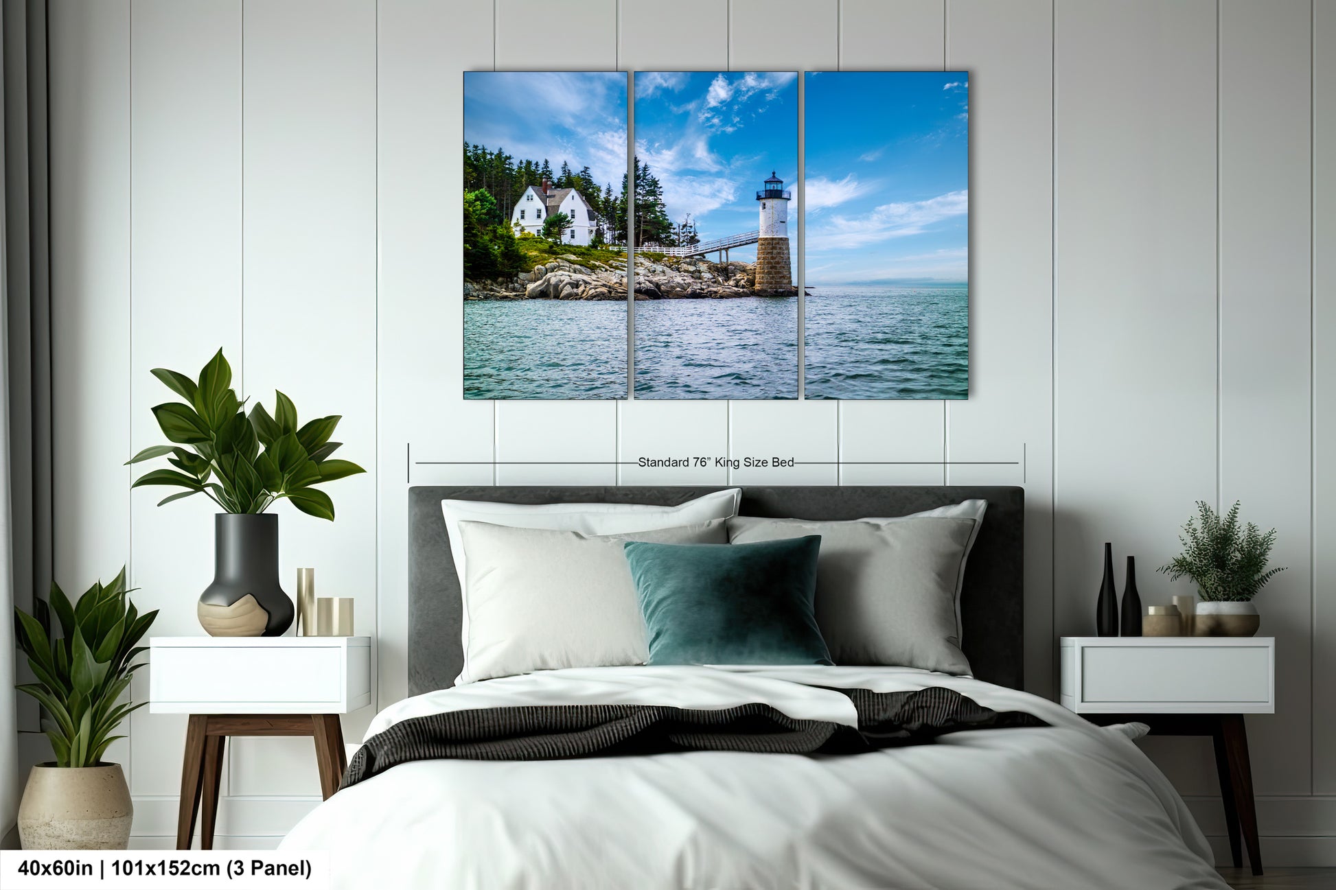 a bedroom with a bed and a picture of a lighthouse on the wall