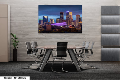 a dining room table with chairs and a painting on the wall