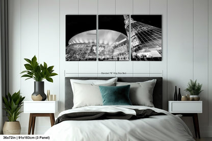 a black and white photo of a bedroom