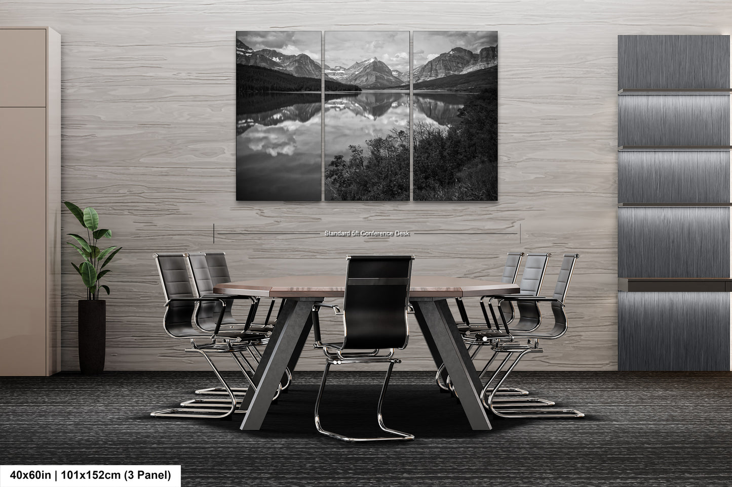 a black and white photo of a table and chairs