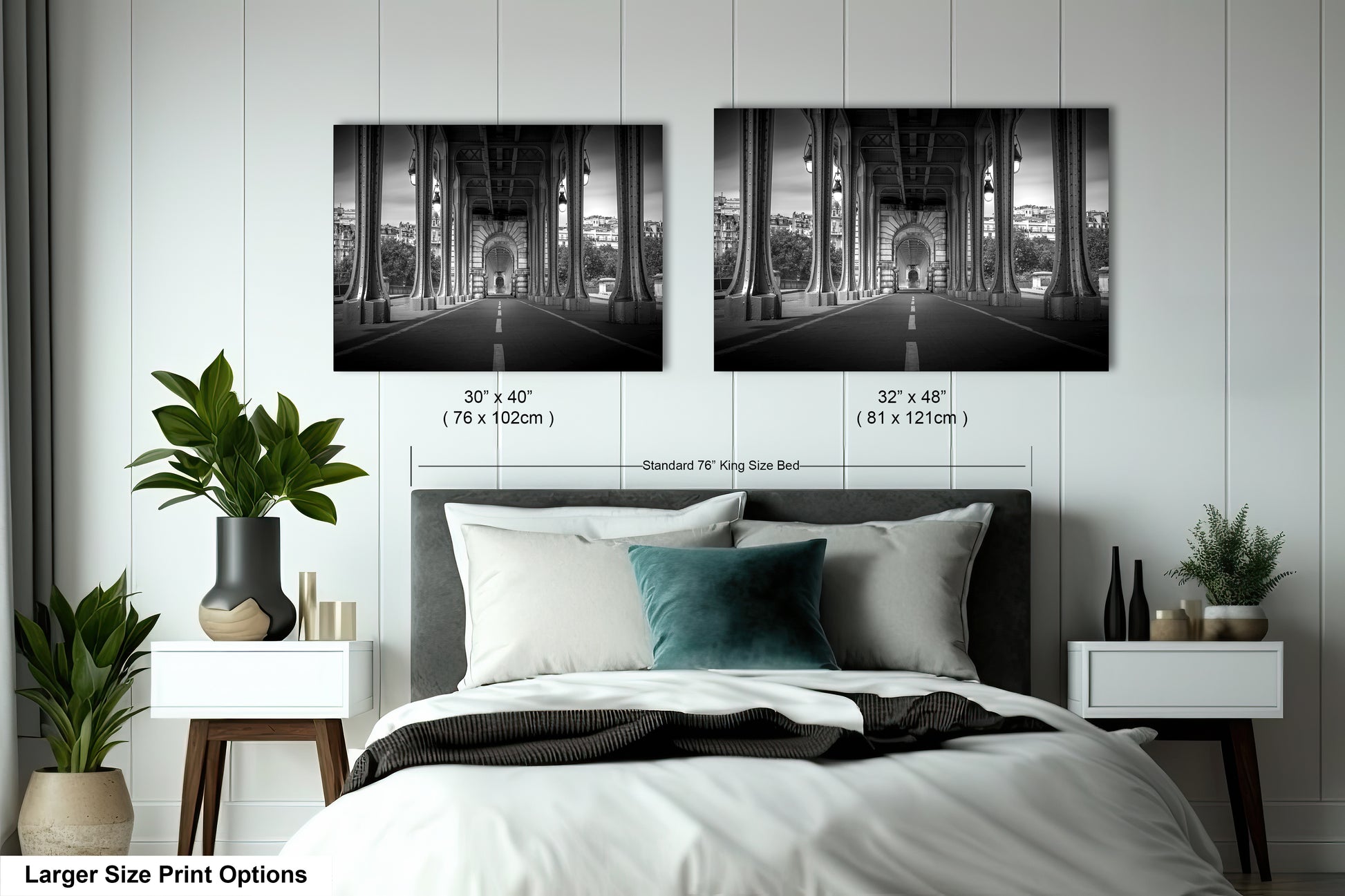 a bedroom with a bed and two pictures on the wall