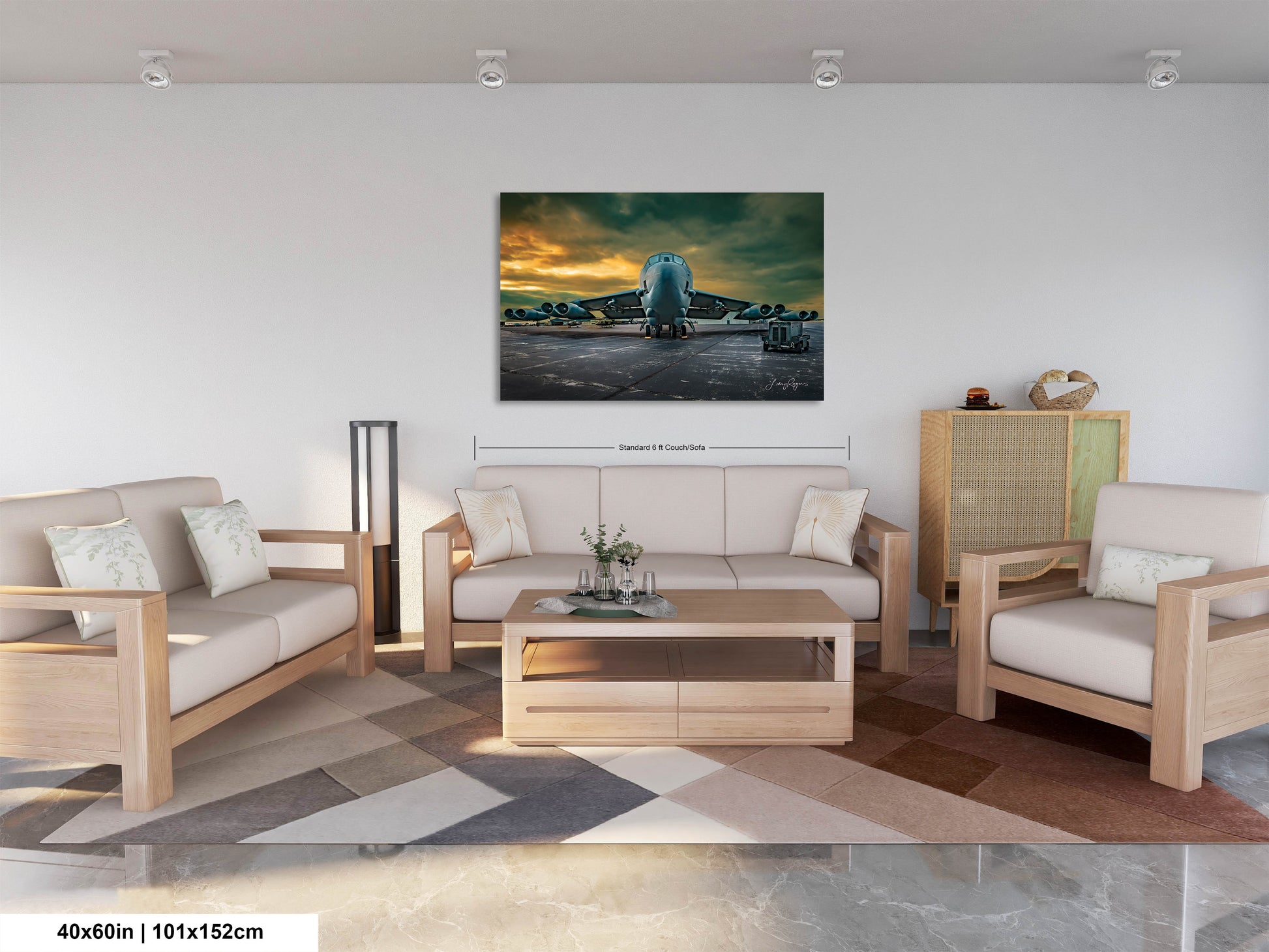a living room filled with furniture and a painting on the wall