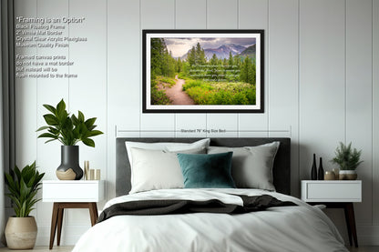a bedroom with a bed and a picture hanging on the wall