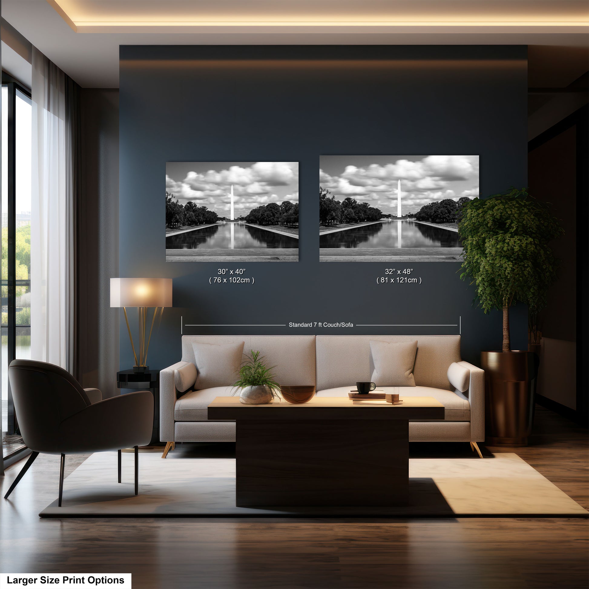 a living room with a couch and two pictures on the wall