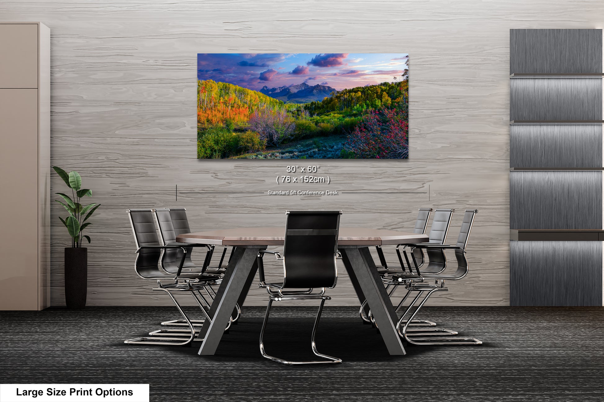 a dining room table with chairs and a painting on the wall