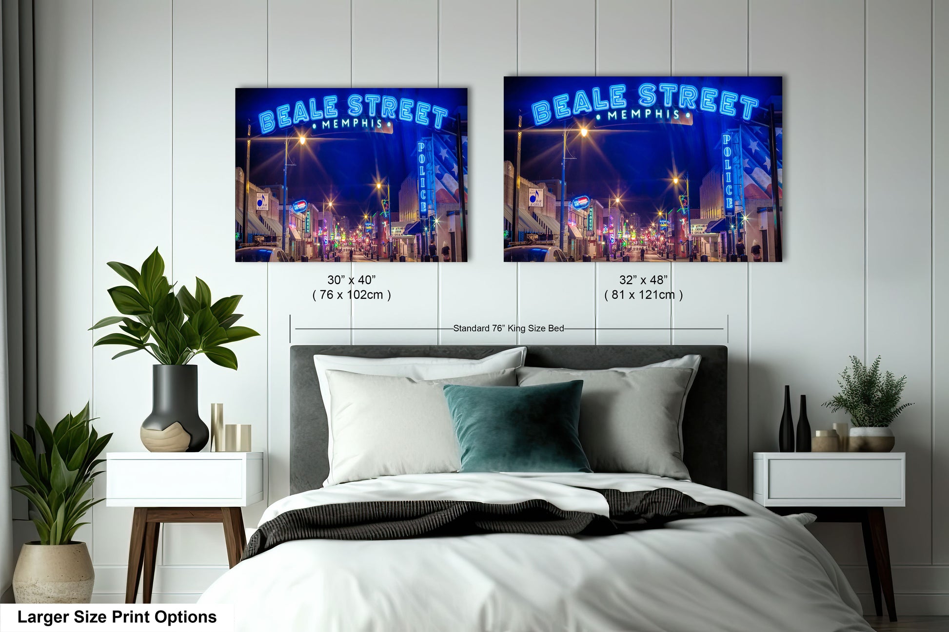 a bed room with a neatly made bed and two pictures on the wall
