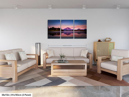 a living room filled with furniture and a painting on the wall