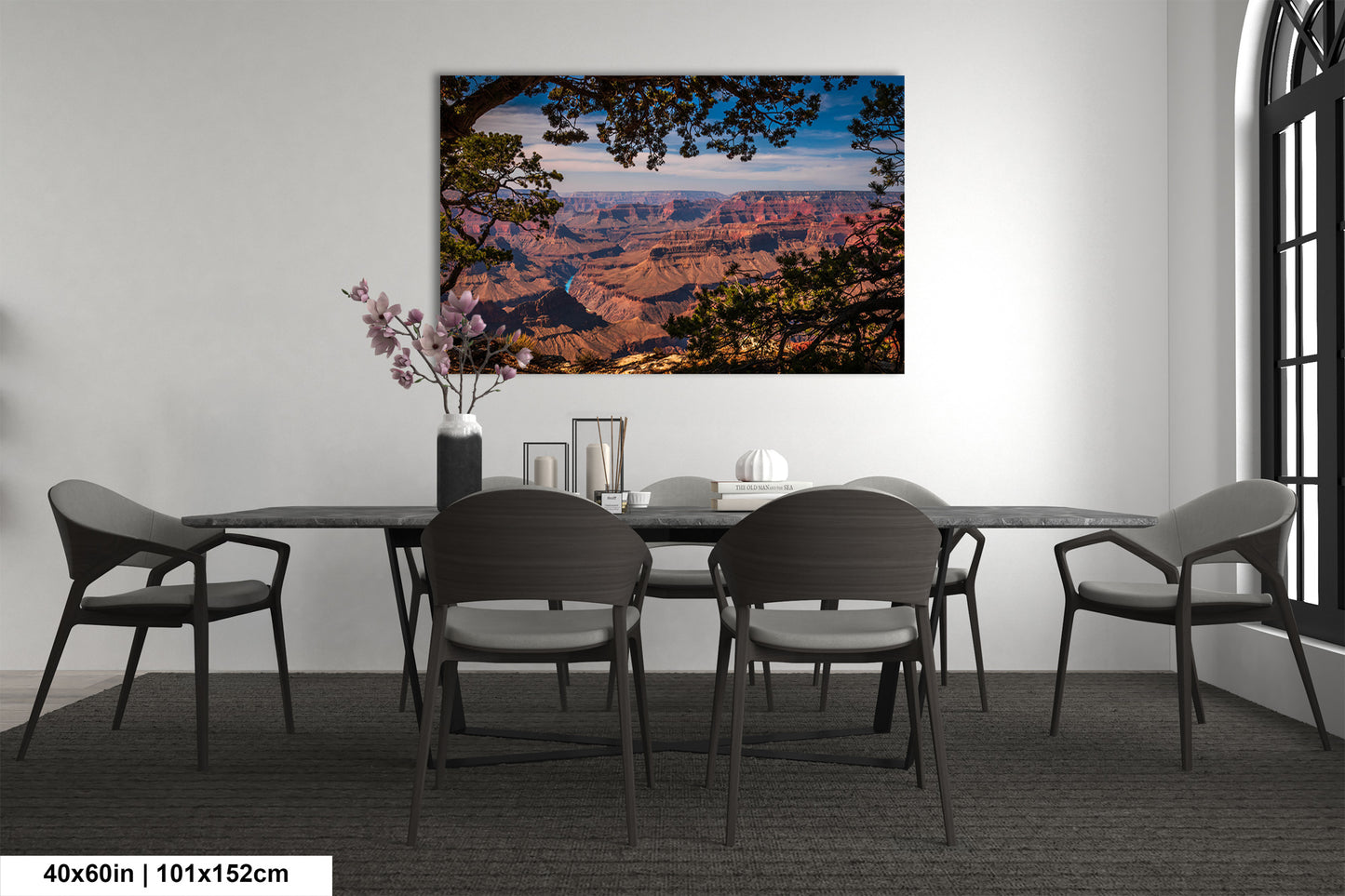 a dining room with a table and chairs
