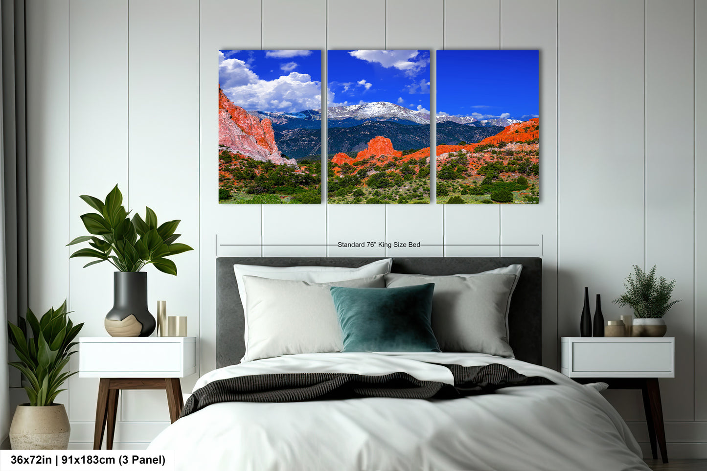 a bed room with a neatly made bed and three pictures on the wall