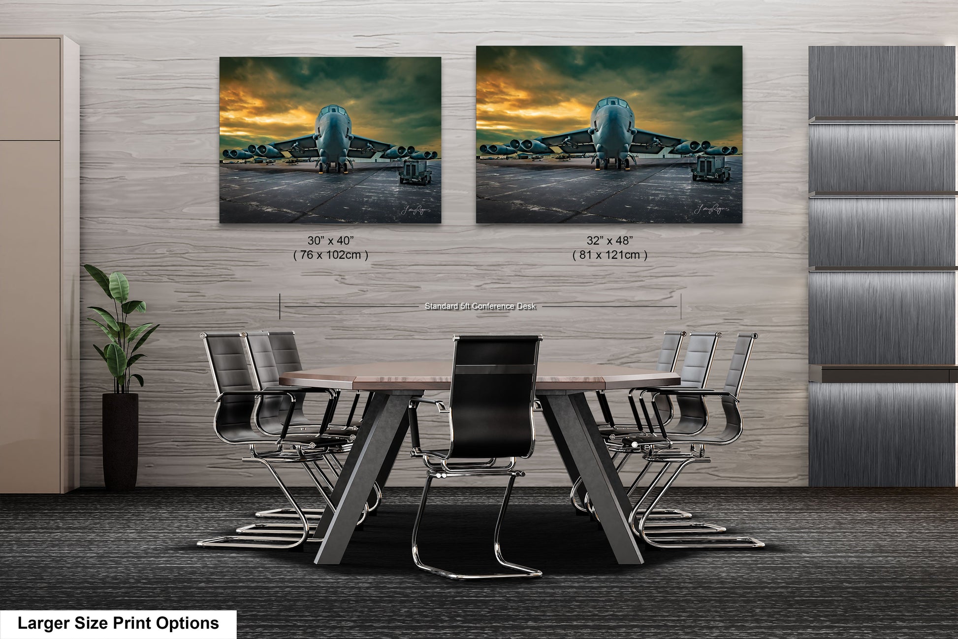 a dining room table with chairs and two pictures on the wall