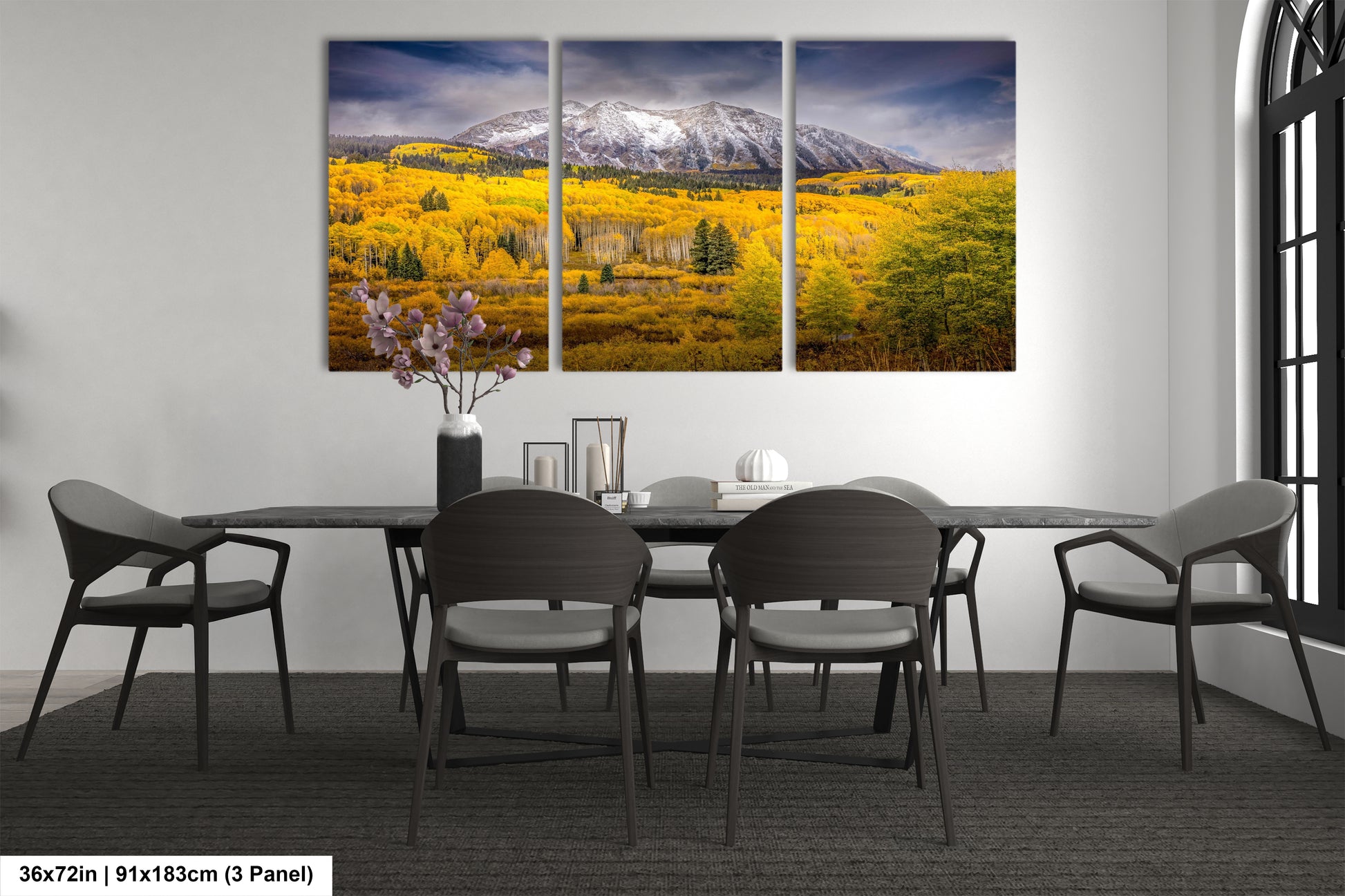 a dining room with a table and chairs