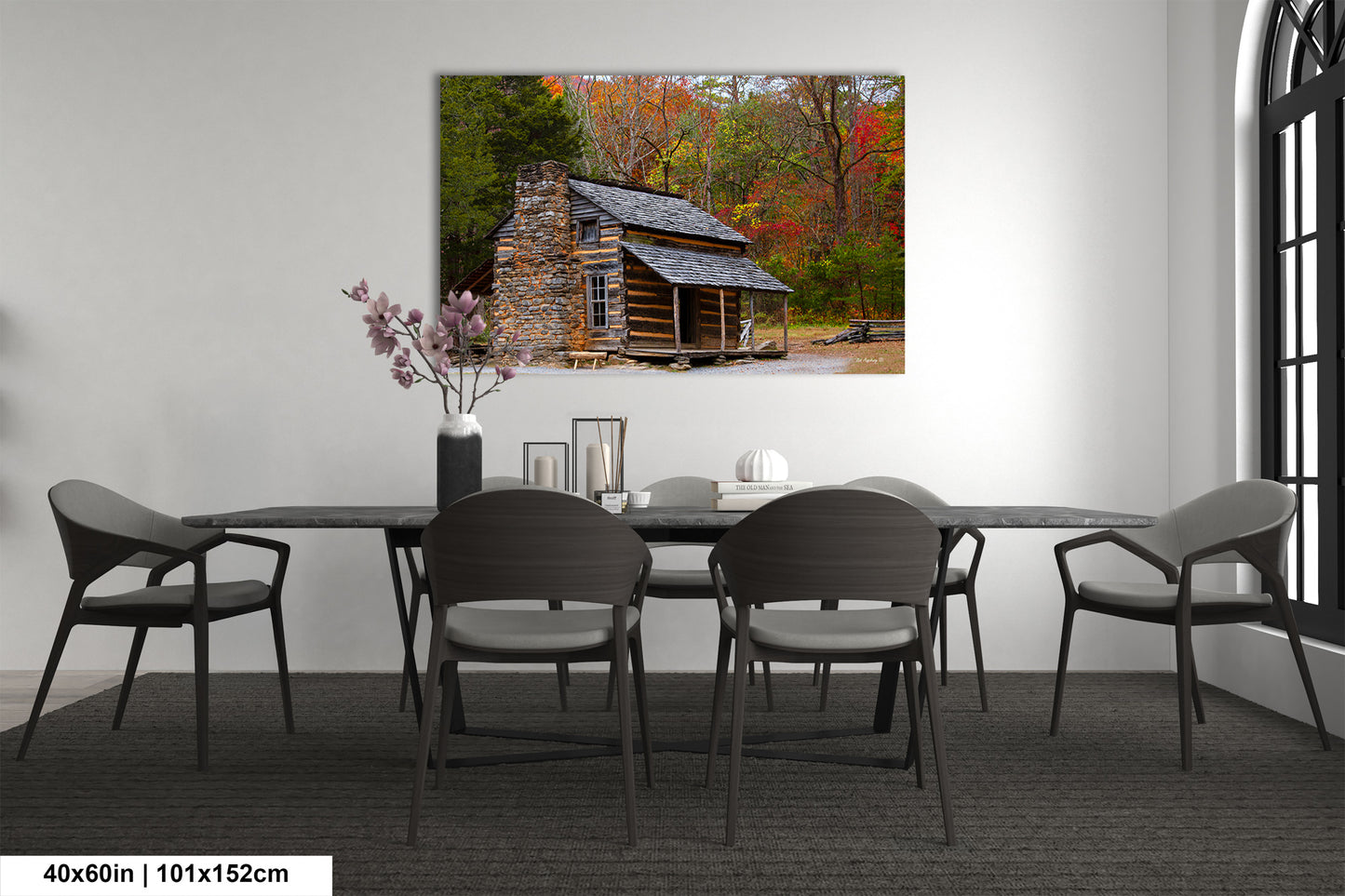 a dining room with a table and chairs