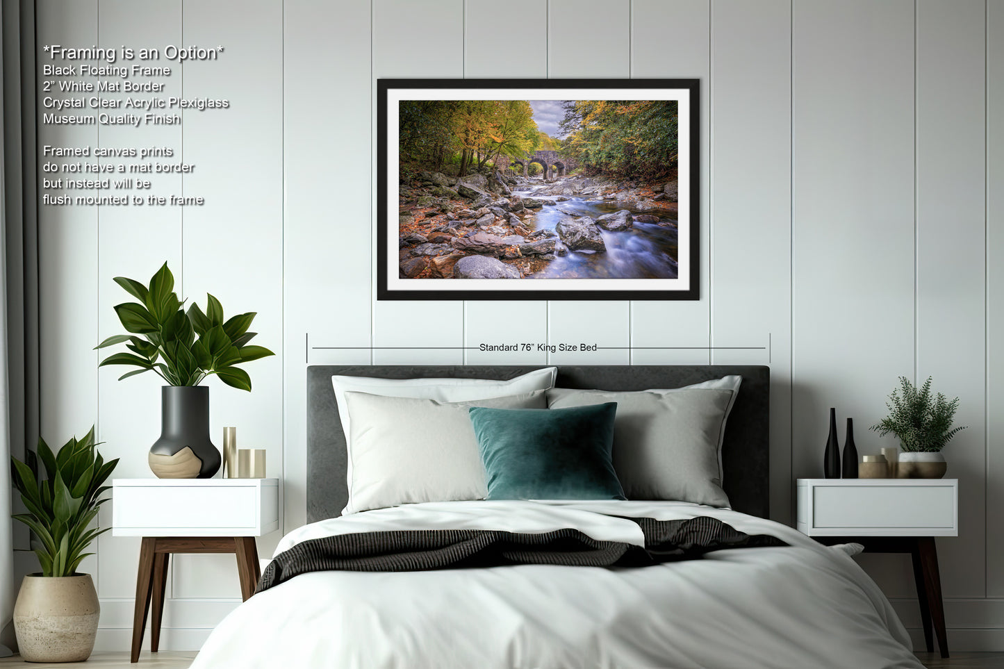 a bedroom with a bed and a picture on the wall