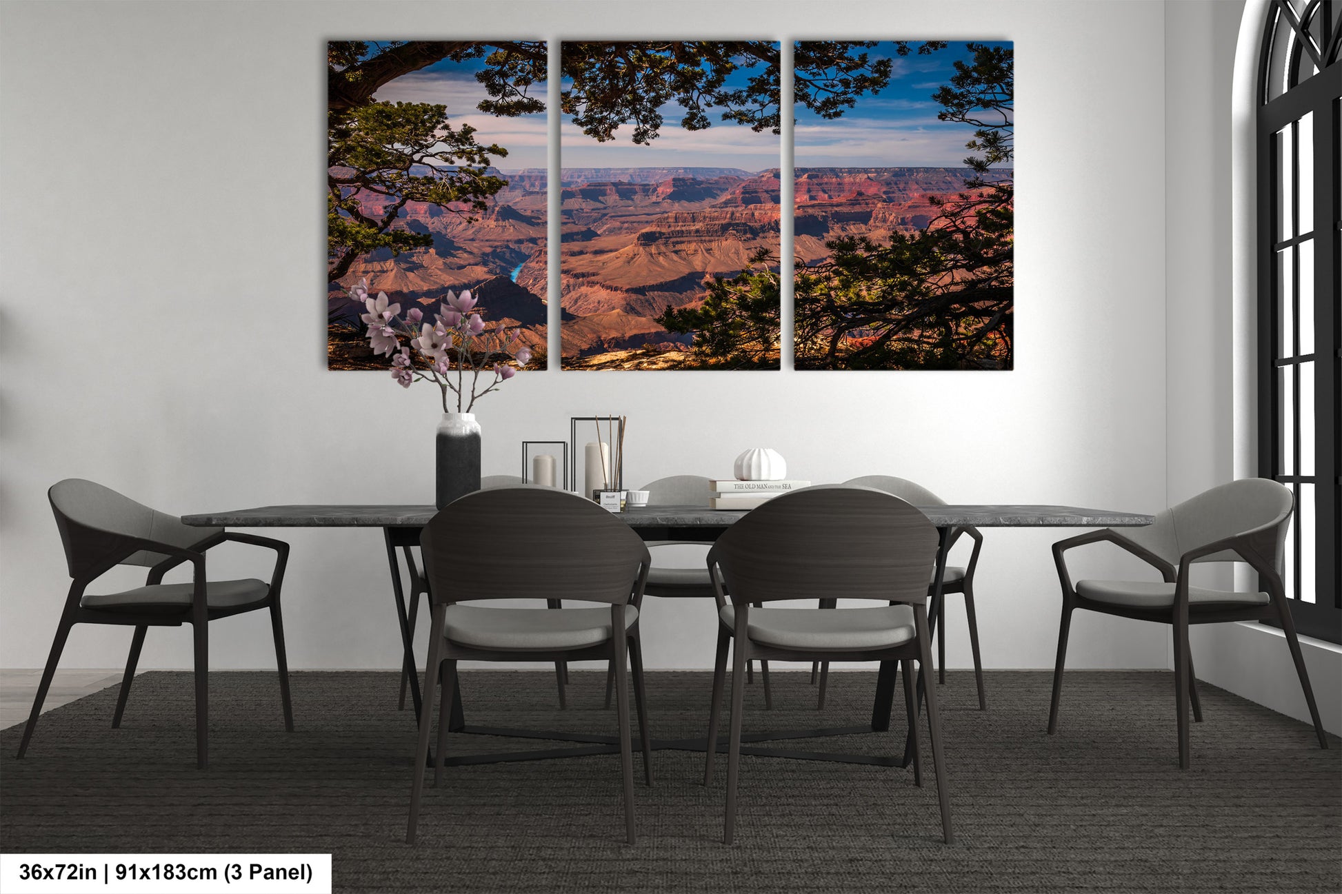 a dining room with a table and four chairs