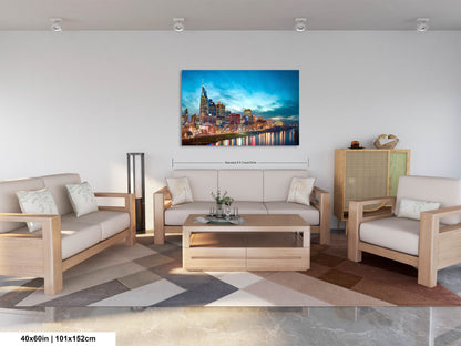a living room filled with furniture and a painting on the wall