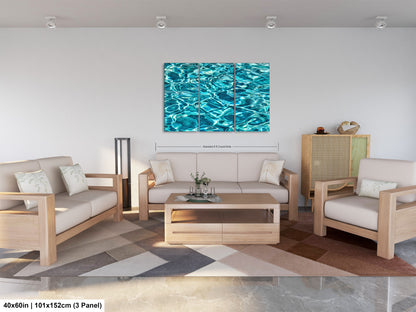 a modern living room with a large, colorful painting of water on the wall. The room is furnished with a sofa, two chairs, and a coffee table, creating a comfortable and inviting atmosphere.