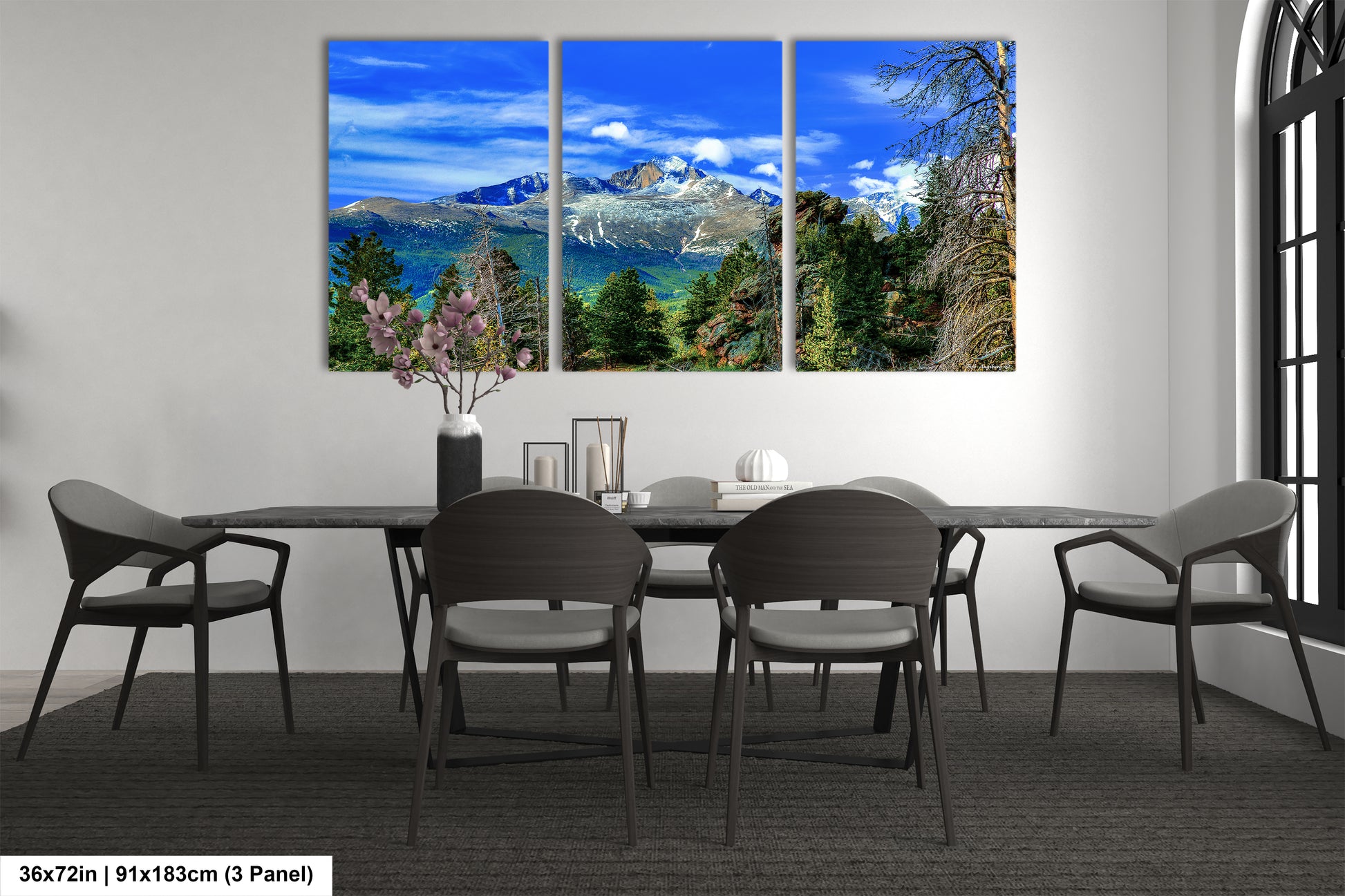 a dining room with a table and four chairs