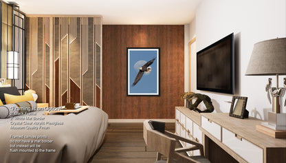 a modern bedroom with a large bed, a wooden dresser, a television, and a framed artwork of a bird in flight.