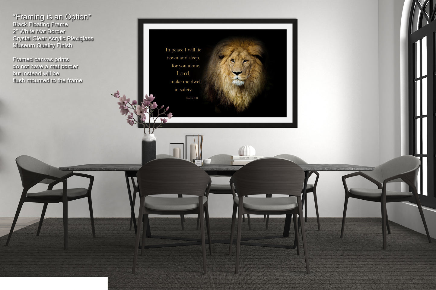 a dining room table with chairs and a framed picture of a lion
