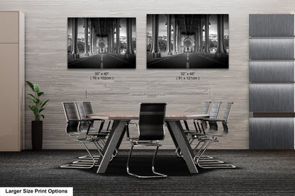 a black and white photo of a table and chairs