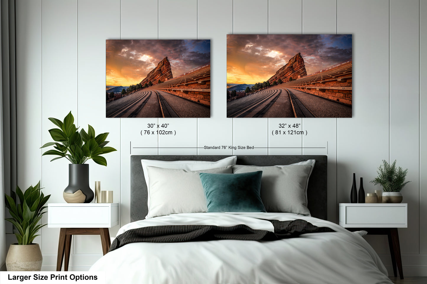 a bedroom with a bed and two pictures on the wall