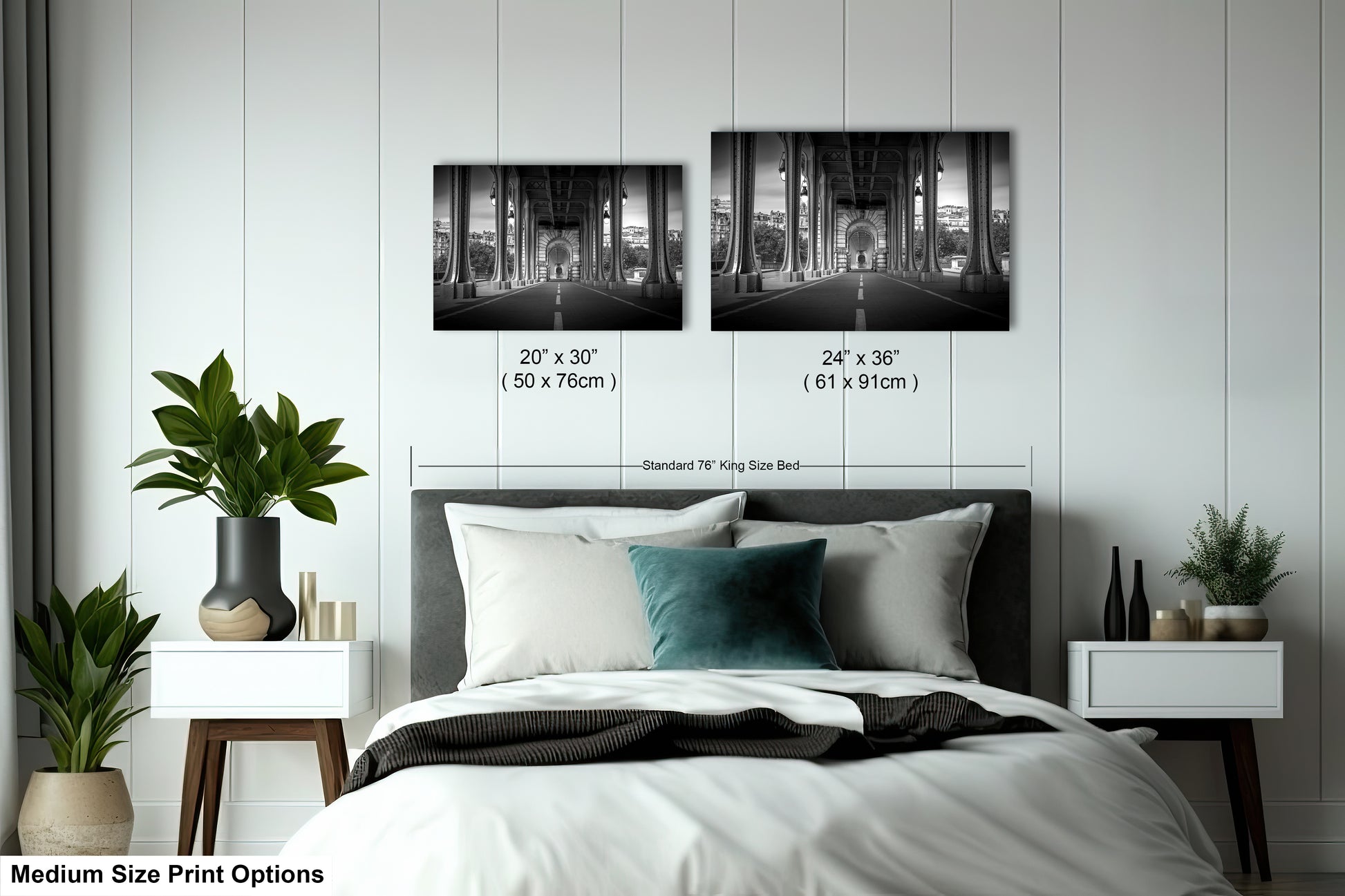 a bedroom with a bed and two pictures on the wall