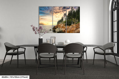 a dining room table with chairs and a painting on the wall