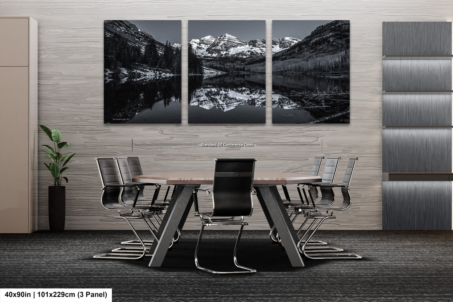 a black and white photo of a table and chairs