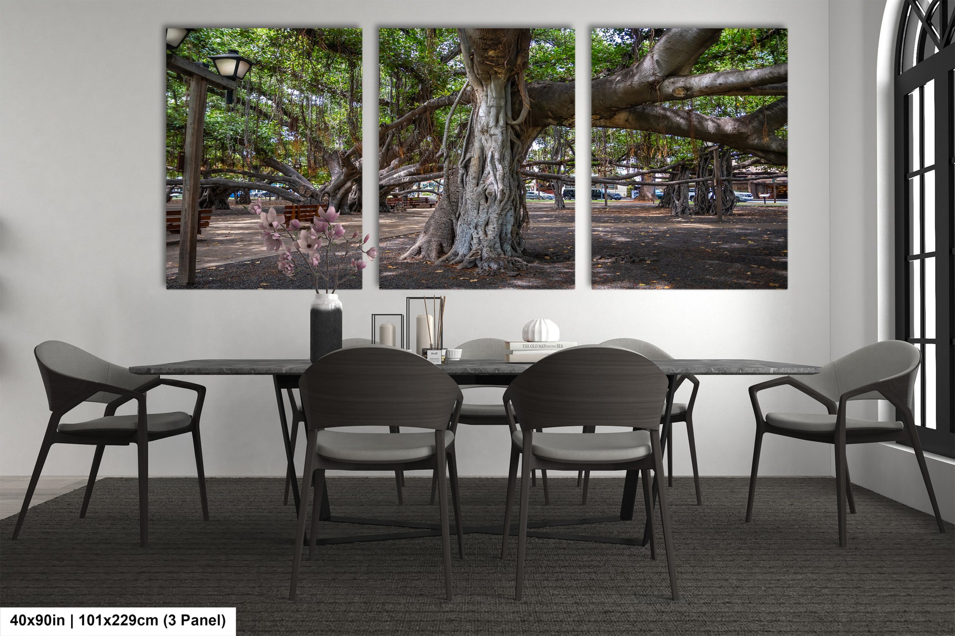 a dining room with a table and four chairs