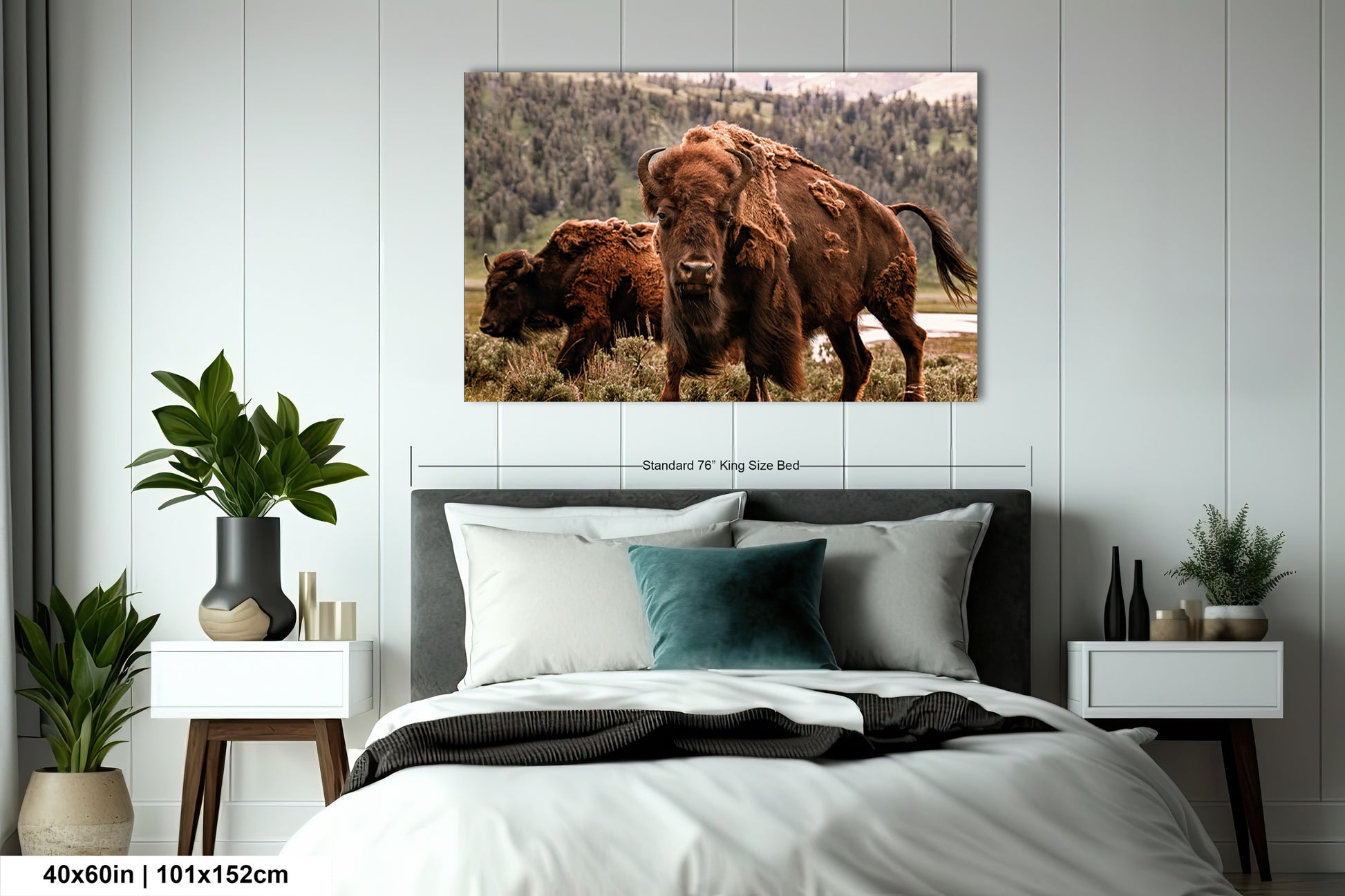 a couple of buffalo standing next to each other on a bed
