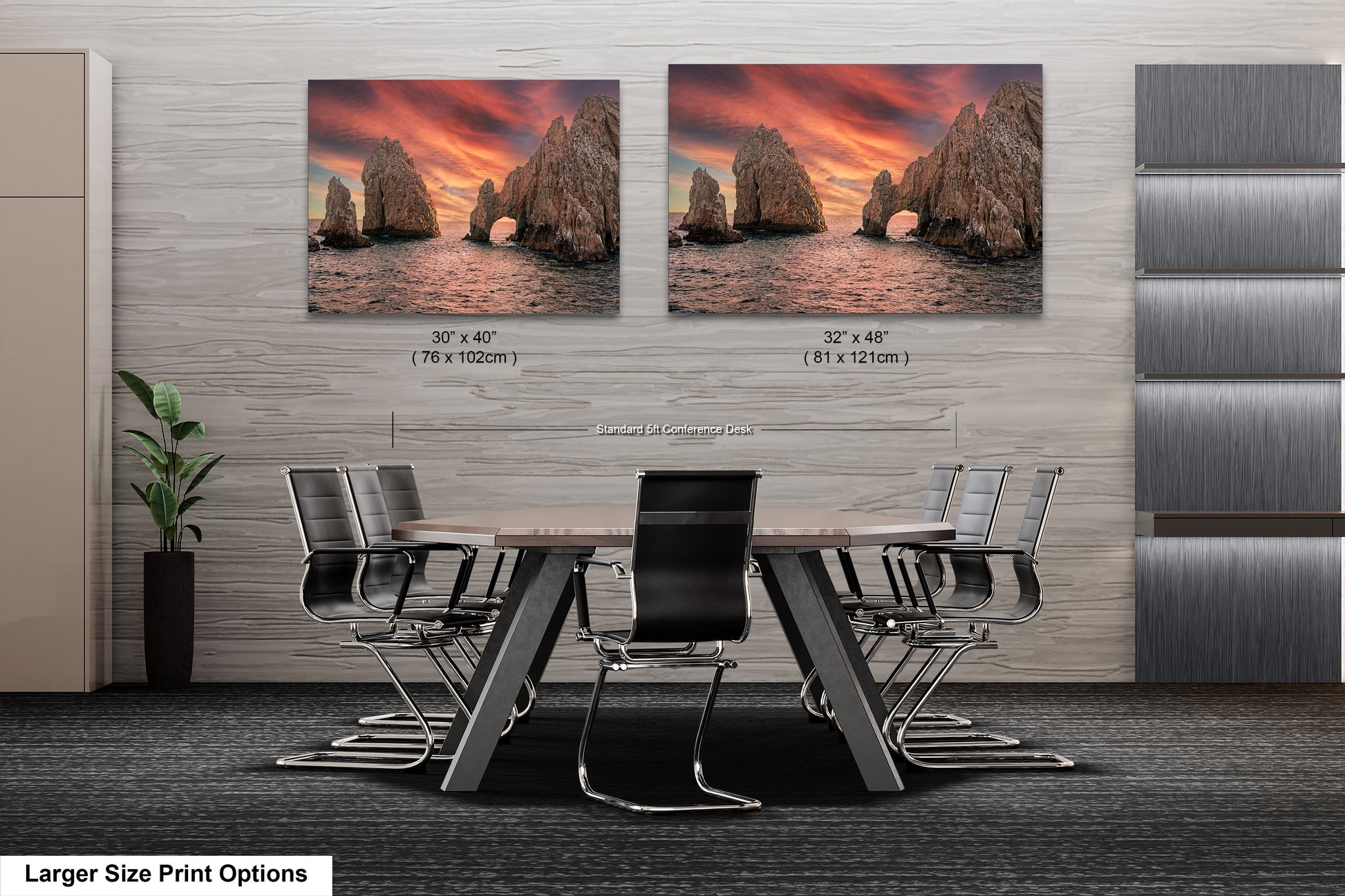 a dining room table with chairs and two pictures on the wall