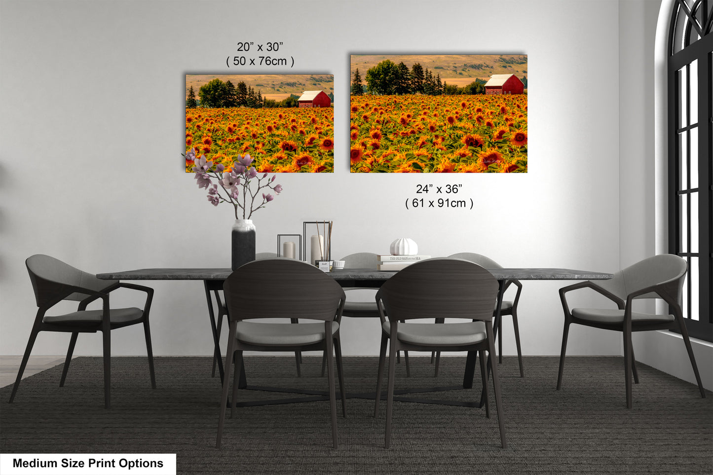 a dining room table with chairs and a vase of flowers