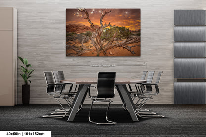 a painting of a tree in a desert setting