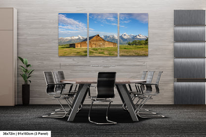 a dining room with a table and chairs