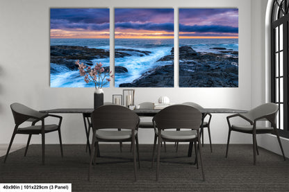 a dining room with a table and chairs