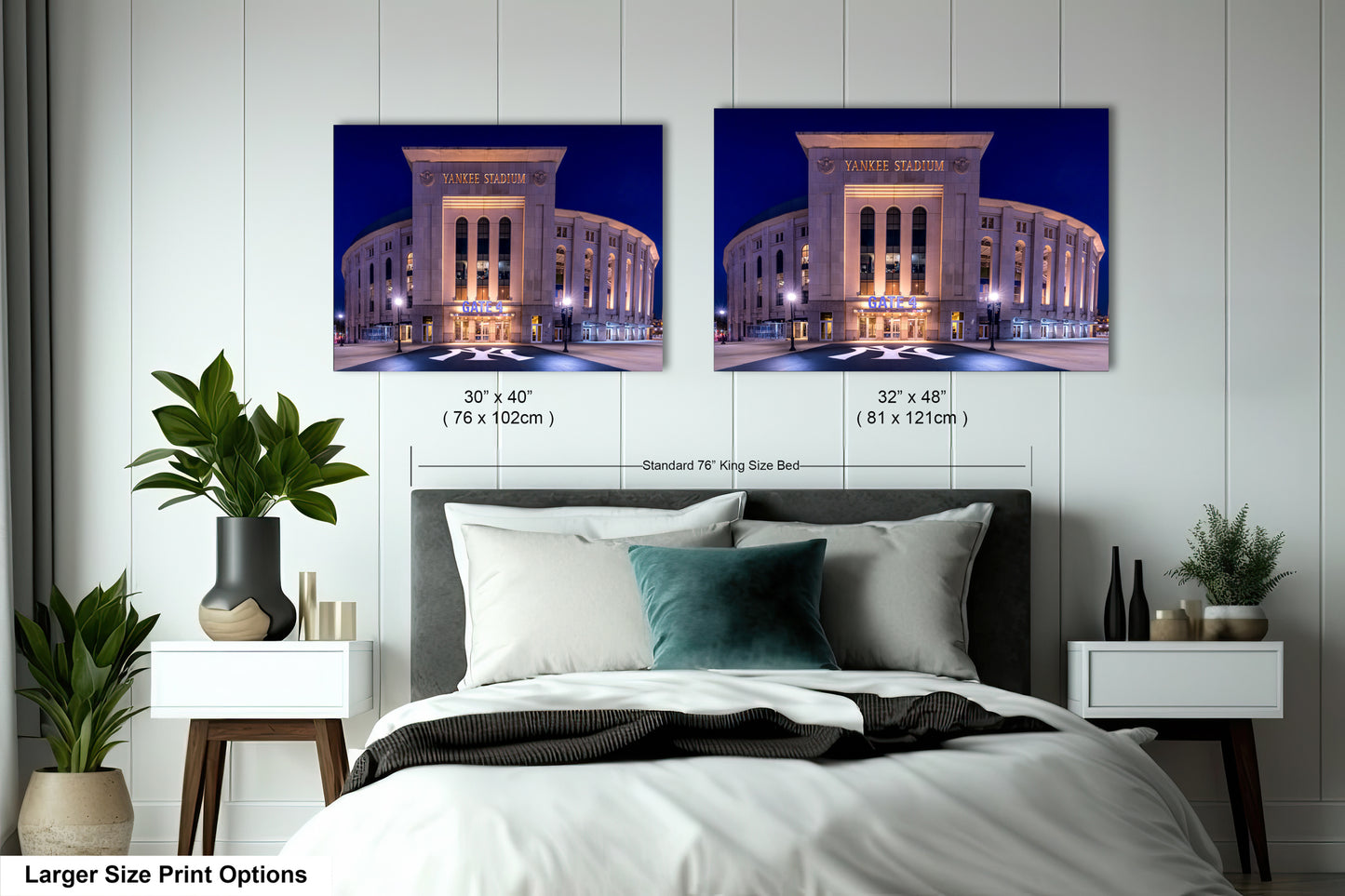 a bedroom with a large bed and two framed pictures of Yankee Stadium, a baseball stadium, hanging on the wall above it.
