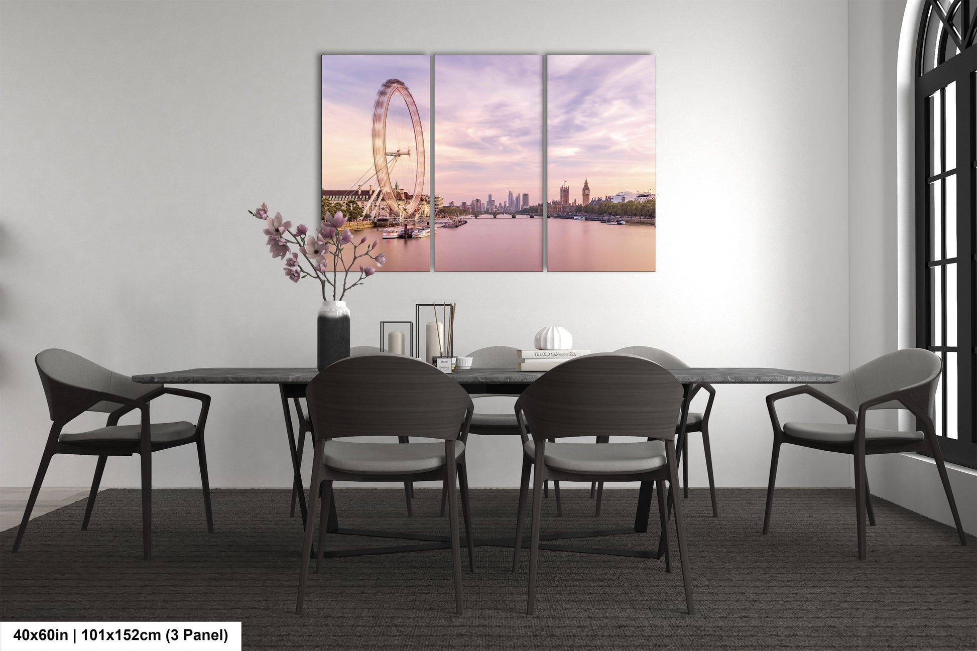 a dining room with a table and chairs