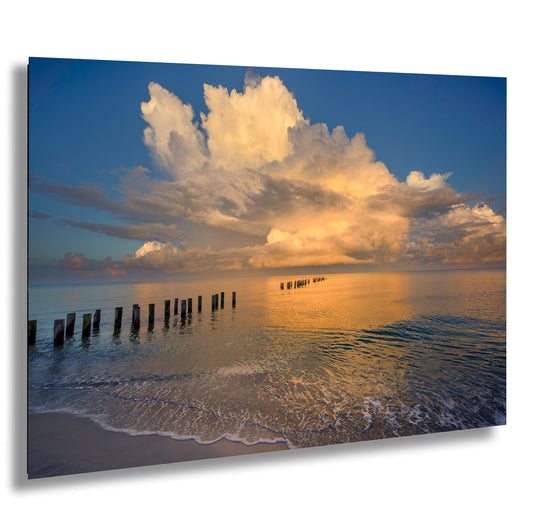 a picture of a cloudy sky over the ocean