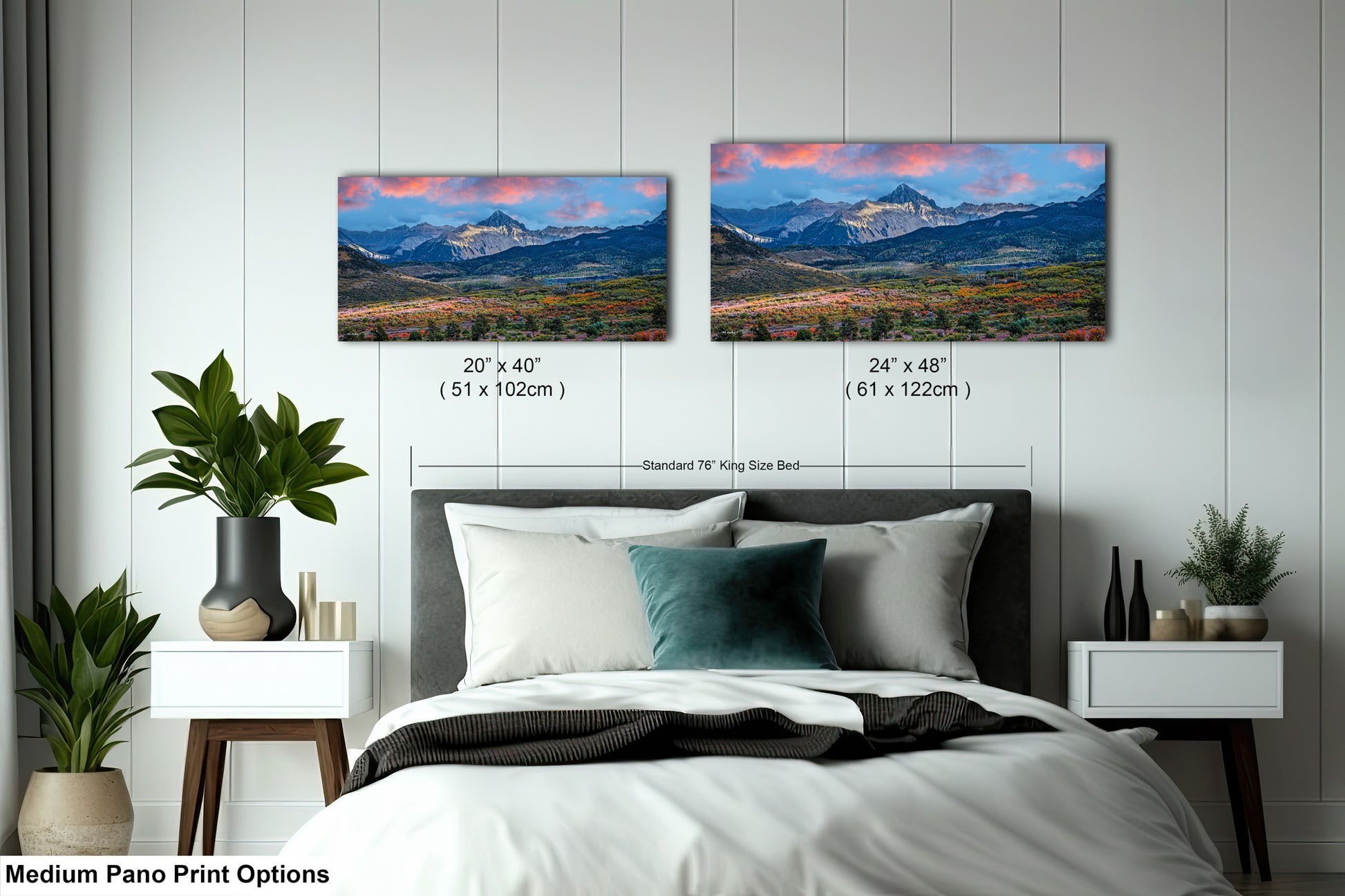 a bedroom with a bed and two pictures on the wall
