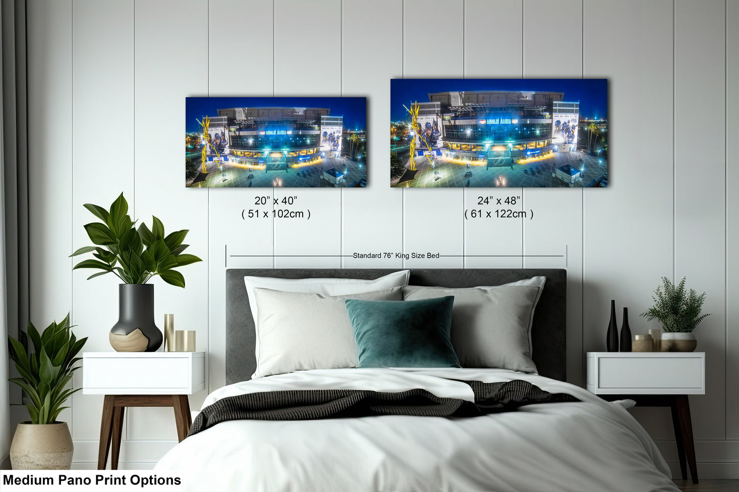 a bed room with a neatly made bed and two pictures on the wall