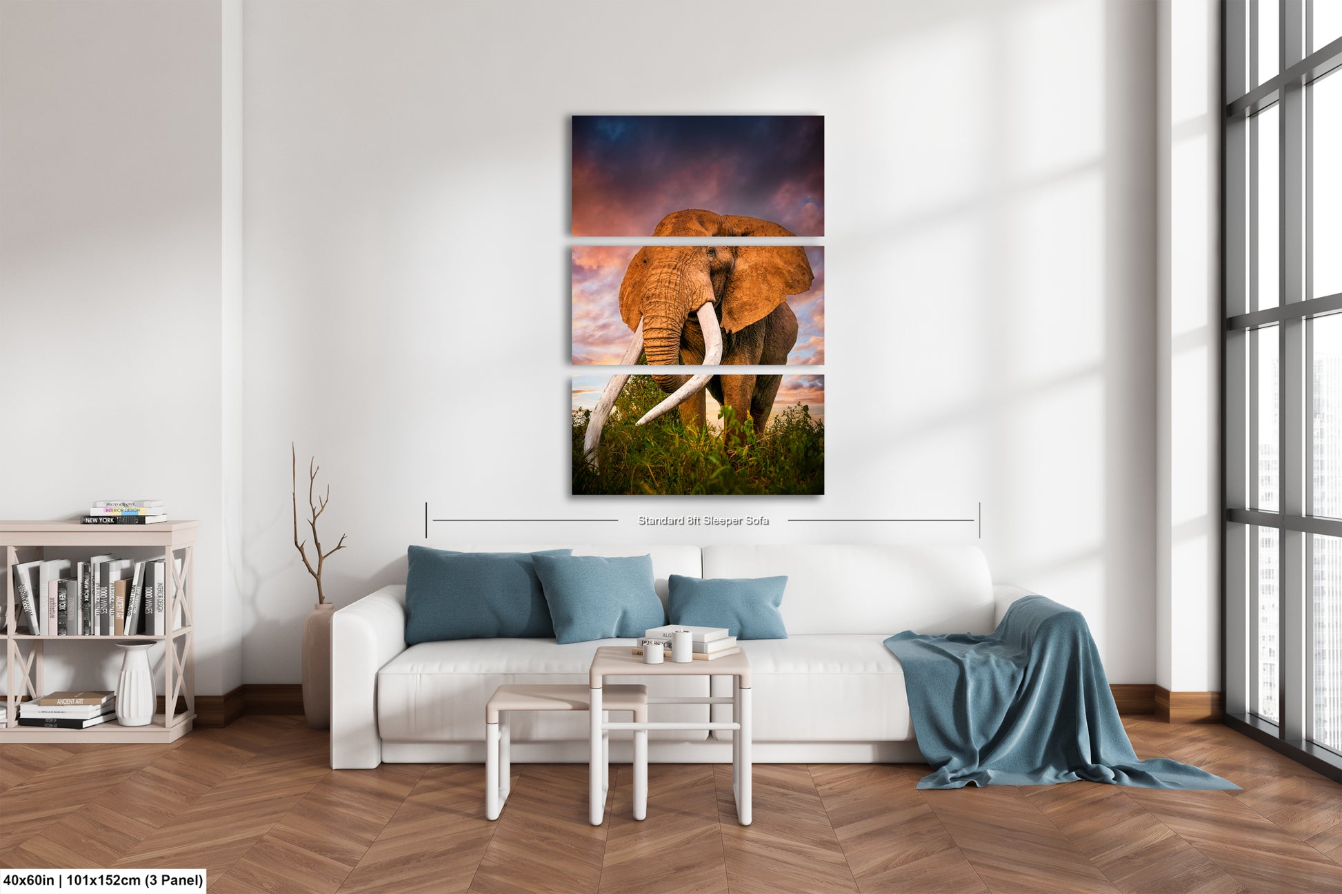 a living room with a couch and a painting on the wall